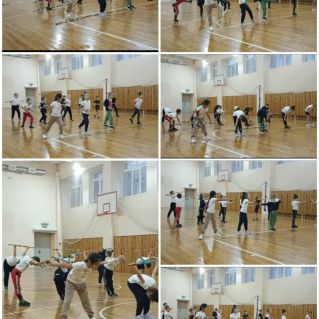 ОРУс гимнастическими палками в начальной школе.