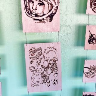 Выставка работ выжигания "Космос"