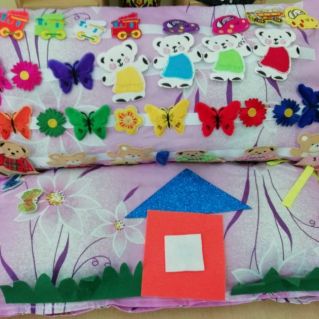 Дидактическое пособие "Занимательная подушка"