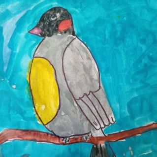 Птица на ветке.