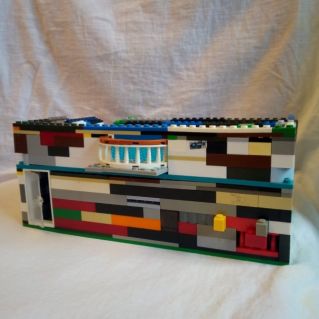 Двухэтажный дом с балконом