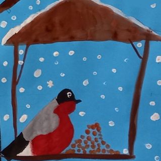 Снегирь на кормушке.