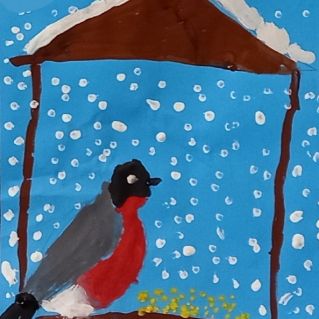 Снегирь на кормушке.