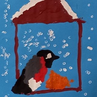 Снегирь на кормушке.