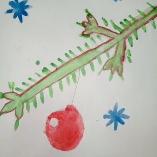 "Ветка елки с новогодней игрушкой"