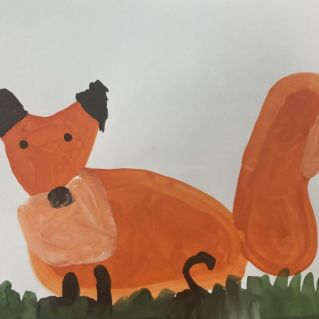 Лиса на лужайке