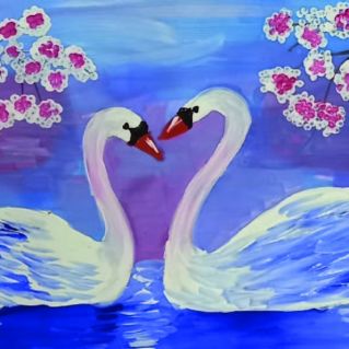 Лебеди на пруду.