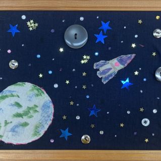 Мир космоса из пуговиц.