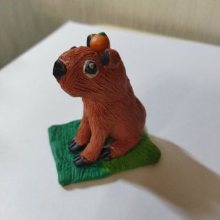 Капибара с апельсином