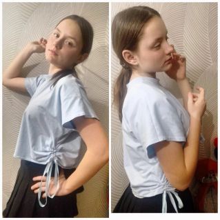 Трикотажный джемпер с драпировкой по боковому шву