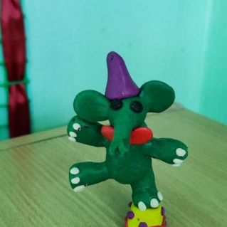 Слон акробат